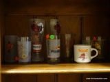 LOT OF VT HOKIES GLASSWARE TO INCLUDE 2 TALL BEER GLASSES, A COFFEE MUG, A TEA GLASS, ETC. ITEM IS