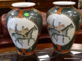 PAIR OF HANDPAINTED PORCELAIN VASES WITH IMAGES OF MEN ON HORSEBACK. EACH MEASURES 11 IN TALL. ITEM