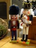 LOT OF 2 VINTAGE HAND PAINTED NUTCRACKERS. 1 IS A DRUMMER AND 1 IS A RIFLEMAN. TALLEST MEASURES 13.5