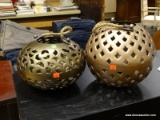PAIR OF HANGING METAL CANDLE HOLDERS WITH ROPE HANDLES. LARGEST MEASURES 11 IN X 10 IN. ITEM IS SOLD