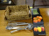 ASSORTED LOT OF ITEMS TO INCLUDE LE CREUSET COOKING UTENSILS, WOVEN BASKETS, AND PRINTS ON CANVAS OF