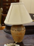 TERRA-COTTA SHELL THEMED LAMP WITH CLOTH SHADE. MEASURES 15 IN TALL. ITEM IS SOLD AS IS WHERE IS