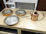 SHELF LOT OF COPPER ITEMS TO INCLUDE A COFFEE POT AND FRYING PANS. ITEM IS SOLD AS IS WHERE IS WITH