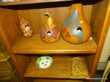 2 SHELF LOT TO INCLUDE GOURD BIRD HOUSES, A BUMBLE BEE BOWL, A WALL HANGING POCKET PLANTER, ETC.
