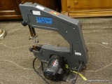 TRADESMAN BRAND BANDSAW IN GRAY AND BLACK. MEASURES 21 IN X 12 IN X 26 IN. ITEM IS SOLD AS IS WHERE