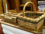 2 PIECE BASKET LOT TO INCLUDE A RECTANGULAR WOVEN AND WOODEN HANDLED BASKET AND A WICKER WOVEN