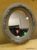 FRAMED MIRROR WITH FLORAL EDGED GOLD TONE FRAME. MEASURES 12 IN X 14 IN. ITEM IS SOLD AS IS WHERE IS