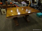DOUBLE PEDESTAL DINING ROOM TABLE. MEASURES 62.5 IN X 43 IN X 30.5 IN. ITEM IS SOLD AS IS WHERE IS