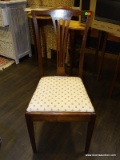 MAHOGANY SIDE CHAIR WITH PIERCED BACK AND CREAM & FLORAL THEMED UPHOLSTERY. MEASURES 18 IN X 18 IN X