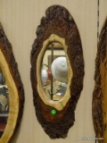 NATURAL WOODEN FRAMED MIRROR. MEASURES 10 IN X 26 IN. ITEM IS SOLD AS IS WHERE IS WITH NO GUARANTEES
