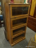 CHERRY 4 DOOR BARRISTER BOOKCASE WITH WOODEN KNOB STYLE HANDLES AND GLASS PANELED FRONTS. MEASURES