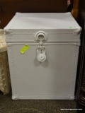 WHITE PAINTED SQUARE TRUNK WITH 2 HANDLES (1 ON EITHER SIDE) AND A LOCKABLE LATCH. MEASURES 18 IN X