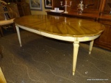 FRENCH PROVINCIAL CREAM COLORED DINING TABLE WITH 1 LEAF. WITH LEAF IN MEASURES 82 IN X 43 IN X 30