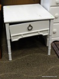 WHITE PAINTED SINGLE DRAWER END TABLE WITH BAMBOO STYLE LEGS. MEASURES 22.5 IN X 26.5 IN X 21.5 IN.