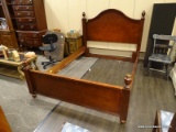 CHERRY QUEEN SIZE BED WITH REEDED SIDES, URN STYLE FINIALS (ARE REMOVABLE), AND WOODEN. MEASURES