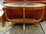 OVAL MAHOGANY CONSOLE TABLE WITH CUT GLASS CENTER, BANDED TOP, REEDED LEGS WITH BRASS ACCENTS, AND A