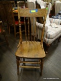 ANTIQUE OAK PRESSED BACK SIDE CHAIR WITH PLANK BOTTOM SEAT AND SPINDLE BACK. MEASURES 17 IN X 21 IN