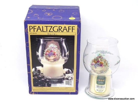 GLASS PILLAR FLOAT CANDLEHOLDER IN THE HOLLY JOY PATTERN BY PFALTZGRAFF. IS IN BOX. ITEM IS SOLD AS