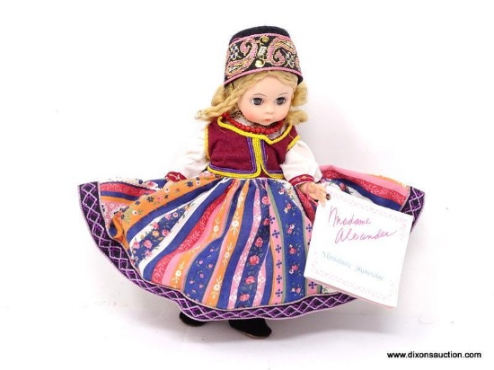 MADAME ALEXANDER "DENMARK" FROM THE MINIATURE SHOWCASE COLLECTION WITH BOX. MEASURES APPROXIMATELY 8