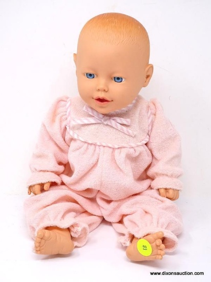 VINTAGE UNIMAX BABY DOLL IN PINK OUTFIT. MEASURES 9.5 IN TALL. ITEM IS SOLD AS IS WHERE IS WITH NO