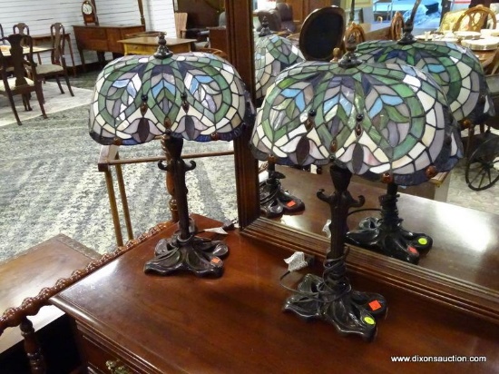 PAIR OF TIFFANY STYLE SLAGGED GLASS LAMPS WITH BRONZE TONED BASES. EACH MEASURES 14 IN X 23 IN. ITEM
