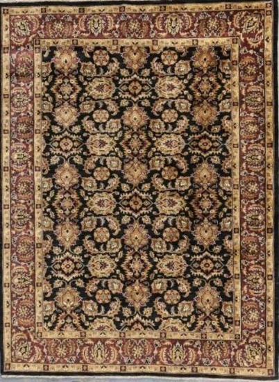 KASHAN RUG BLACK/PLUM 5'6"X8'. THIS FINE ONE OF A KIND HAND KNOTTED RUG DESIGN ORIGINATED IN THE