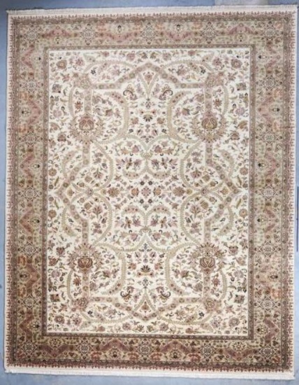 ISFAHAN CREAM/TAUPE PRIVATE RESERVE 10X14. THIS HIGH QUALITY HAND KNOTTED REPRODUCTION OF A FINE