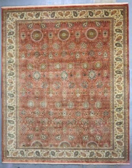 ISFAHAN SALMON/CREAM PRIVATE RESERVE 10X14. THIS HIGH QUALITY HAND KNOTTED REPRODUCTION OF A FINE