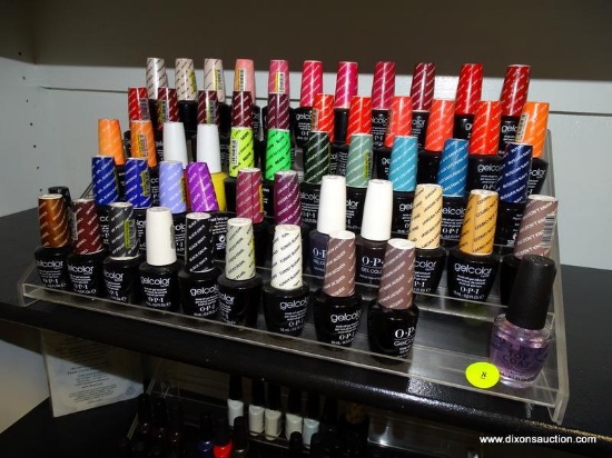 APPROX. 53 BOTTLES OF GELCOLOR BY OPI NAIL POLISH. VARIOUS DIFFERENT COLORS. SLIGHTLY USED.