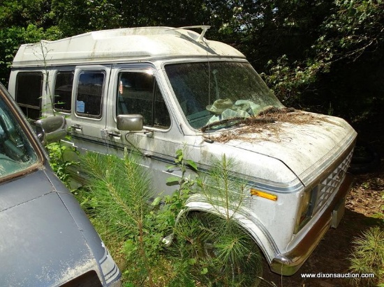 (OUT) 1991 FORD VAN WITH WHEEL CHAIR LIFT, WOOD GRAIN INTERIOR, VIN #1FDEE14N3MHA 13928. ITEM IS