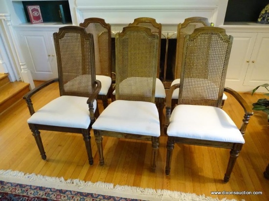 (DR) SET OF 6 CANE BACK AND CREAM UPHOLSTERED DINING CHAIRS. 4 ARE SIDES AND 2 ARE ARMS. ARM CHAIRS