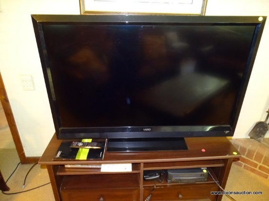 (DWN LR) VIZIO 48" LCD HDTV WITH MANUAL AND REMOTE. IS IN WORKING CONDITION. ITEM IS SOLD AS IS