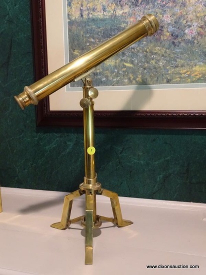 (LR) BRASS SHIPS STYLE TELESCOPE WITH 3 LEGGED BASE. MEASURES 14.5 IN X 20.5 IN. ITEM IS SOLD AS IS