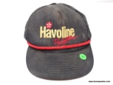 BLACK WITH RED ROPE TRIM ON LID OF HAT, INCLUDES HAVOLINE RACING TEAM WORDING ON FRONT OF HAT, HAS