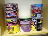ASSORTED LOT OF CONTAINERS WITH NASCAR THEMES. 2 ARE COUNTRY TIME LEMONADE (HAVE CONTENTS) AND 3 ARE