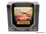 RACING CHAMPIONS 1:64 SCALE DIECAST CAR OF THE #27 DRIVEN BY HUT STRICKLIN. IS 1 OF 60,000. IS IN