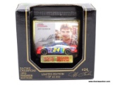 RACING CHAMPIONS 1:64 SCALE DIECAST CAR OF THE #24 DRIVEN BY JEFF GORDON. IS 1 OF 40,000. IS IN