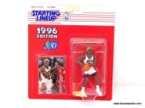 STARTING LINEUP 1996 NBA FIGURE OF DENNIS RODMAN WITH GREEN HAIR. IS IN BLISTER PACKAGE. ITEM IS