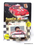 RACING CHAMPIONS 1:64 SCALE #11 STOCK CAR DRIVEN BY BILL ELLIOTT WITH COLLECTIBLE CARD. IS IN