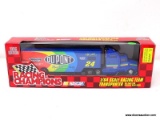 RACING CHAMPIONS 1:64 SCALE RACING TEAM TRANSPORTER WITH DIECAST CAB AND OPENING REAR DOOR FOR THE