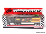 MATCHBOX SUPER STAR TRANSPORTER IN PACKAGE FOR TEXACO RACING. PACKAGE IS DAMAGED. ITEM IS SOLD AS IS
