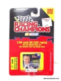 RACING CHAMPIONS 1:144 SCALE 1997 DIECAST REPLICA OF THE #6 CAR DRIVEN BY MARK MARTIN. IN BLISTER