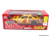 RACING CHAMPIONS 1/24 SCALE DIECAST STOCK CAR REPLICA OF THE #4 KODAK CAR DRIVEN BY STERLING MARLIN.