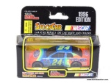 RACING CHAMPIONS 1:64 SCALE REPLICA DIECAST BODY AND CHASSIS OF THE #24 CAR DRIVEN BY JEFF GORDON.