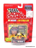 RACING CHAMPIONS 1:64 SCALE STOCK CAR OF THE #4 CAR DRIVEN BY STERLING MARLIN. IS IN BLISTER
