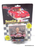RACING CHAMPIONS 1:64 SCALE STOCK CAR OF THE #70 CAR DRIVEN BY J.D. MCDUFFIE. IS IN BLISTER PACKAGE.