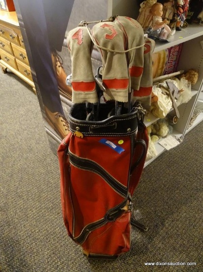 (R1) SET OF TOP FLITE GOLF CLUBS WITH RED LEATHER CADDY BAG AND SOCK STYLE COVERS FOR THE DRIVERS.