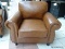 BRAND NEW MORTARA LEATHER ARMCHAIR IN BROWN.