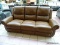 3 CUSHION MANUAL RECLINING SOFA IN BROWN. MEASURES 85 IN X 36 IN X 42 IN. SIMILAR ITEMS RETAIL FOR