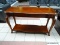 CHERRY CONSOLE/SOFA/HALL TABLE WITH SCALLOPED EDGING, A SINGLE DRAWER, AND A LOWER SHELF. MEASURES